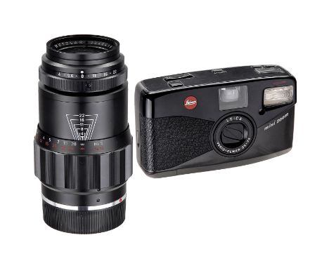 Leica "mini zoom" und Tele-Elmar M 4/135 mm  1) Leitz, Wetzlar. Tele-Elmar M 4/135 mm Nr. 2046419, Glas bei Punktlicht innen 