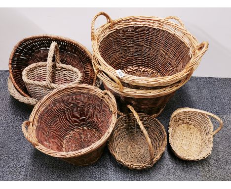 A group of vintage cane baskets, largest Dia. 50cm.