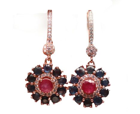 A pair of 925 silver rose gold gilt drop earrings set with round cut ruby and sapphires, L. 3.8cm.