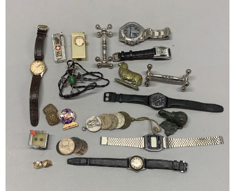 A box of interesting vintage watches and other items.