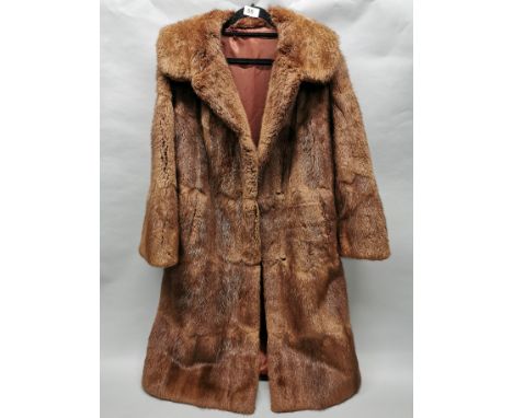 A vintage ladies' fur coat, understood to be European red squirrel, L. 109cm.
