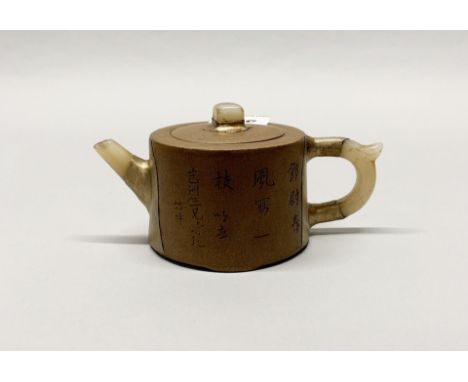 A Chinese metal mounted terracotta teapot with white jade spout and handles, H. 9cm, spout to handle L. 18cm.