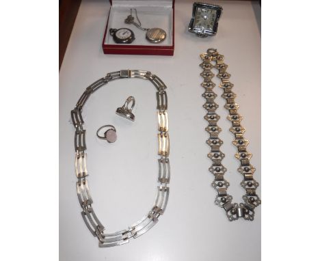 A STERLING SILVER LOCKET AND CHAIN, two silver rings, travel clock, small open-face pocket watch and two white metal necklace