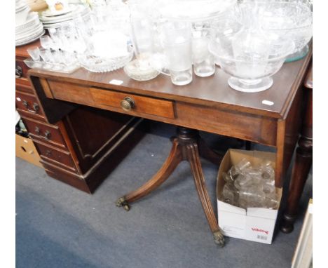 A REGENCY MAHOGANY SOFA TABLE on a central column with four downswept legs, 35" wide