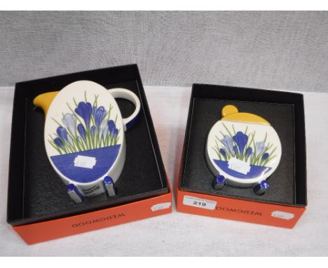 WEDGWOOD: A REPRODUCTION 'CLARICE CLIFF' BIZARRE TEAPOT AND SUCRIER, hand painted in the 'Crocus' design (boxed)