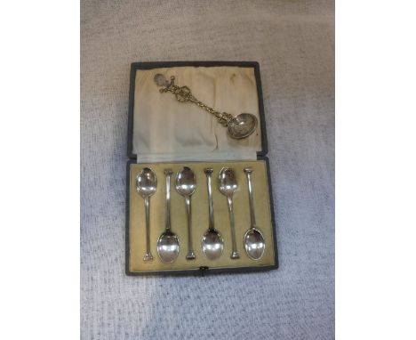 A SET OF SIX SILVER-CASED COFFEE SPOONS, and a spoon made from a Dutch coin