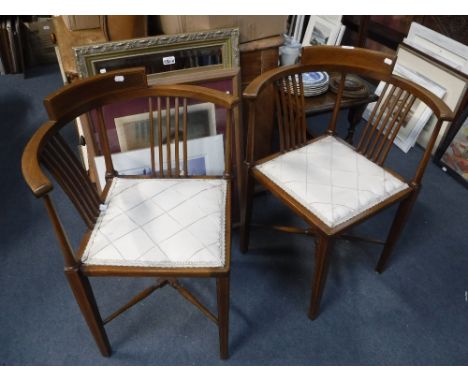 A PAIR OF EDWARDIAN MAHOGANY CORNER CHAIRS with pin-cushion seats 