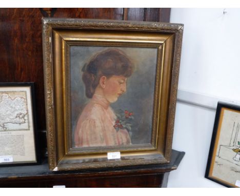 AN EDWARDIAN OIL ON CANVAS PORTRAIT OF A WOMAN with a bunch of rose-hips