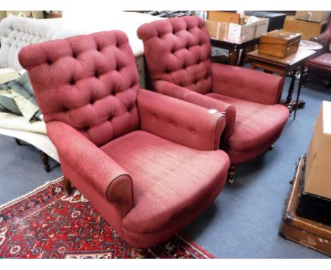 A PAIR OF VICTORIAN STYLE BUTTON-BACK ARMCHAIRS upholstered in red Colefax & Fowler material 