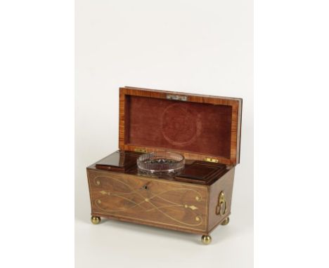 A REGENCY ROSEWOOD SARCOPHAGUS FORM BRASS INLAY TEA CADDY, the raised lid with central brass paterae, with twin lidded compar