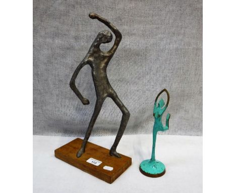 AN ALUMINIUM STYLISED STUDY OF A MAN, the wooden base with label 'Manuscript Fine Quality Art Products Liskeard Cornwall' and