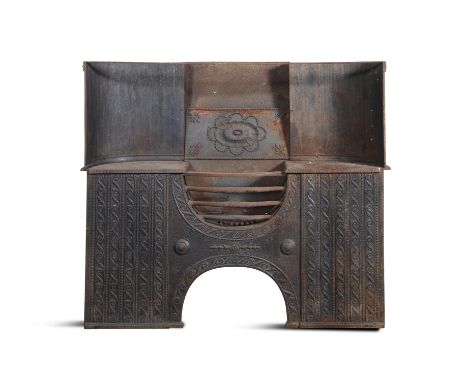 A CAST IRON FIRE SURROUND, with raised curved back centred with a paterae and acanthus leaves to each corner and centred meda