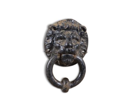 A CAST IRON LION MASK AND RING HANDLE DOOR KNOCKER, 19TH CENTURY, 18cm
