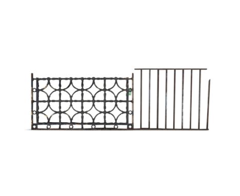 EIGHT SECTIONS OF BLACK-PAINTED CAST IRON ESTATE RAILING, of pierced form and differing dimensions, 148cm high, 212cm wide ap