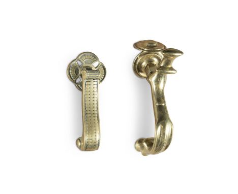 A CAST BRASS DOOR KNOCKER, of foliate scroll form 22cm high, and another example, 18cm high (2)