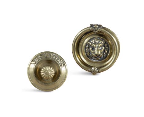 A VICTORIAN BRASS CIRCULAR 'VISITORS' BELL PULL, with fluted pull handle 13cm diameter; together with a 19th century lion mas