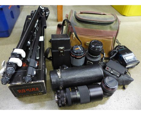 A Miranda tripod, Vivitar, 100-130mm lens, other lenses, filters and camera bag **PLEASE NOTE THIS LOT IS NOT ELIGIBLE FOR PO