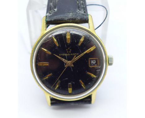 An Eterna-Matic wristwatch with black dial and date, the case back bears inscription dated 1966 