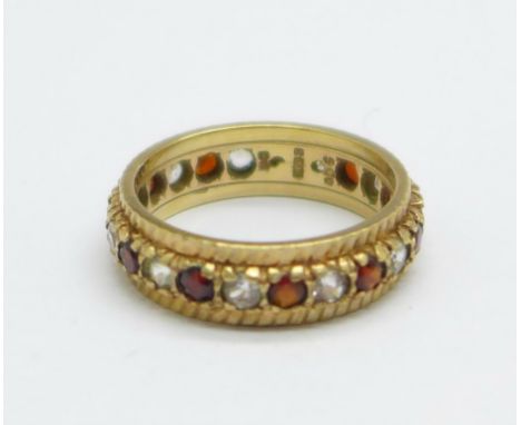 A 9ct gold, red and white stone eternity ring, 3g, K 