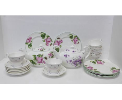 An Aynsley English Rose teapot and six 20.5cm plates, an Aynsley English Violets teapot and six Royal Albert Rose Buds Everyd