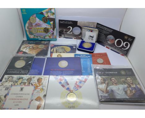 A collection of sport related commemorative coins; including three £5 coins, 2 x 2012 and one England football, a 100th Anniv