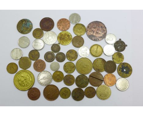 A Marshall Islands 10 dollar commemorative coin, Lancaster Bomber, and other tokens, etc. 