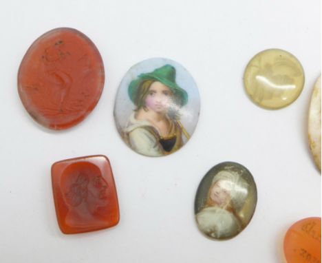 An unmounted cameo, three small portrait plaques and five seal stone intaglios 