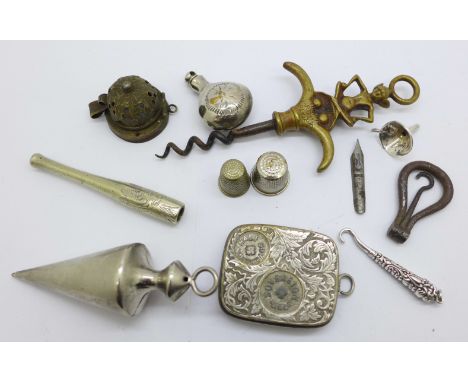 A silver button hook, a hallmarked silver perfume funnel, a/f, a corkscrew, a coin holder, etc. 