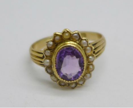 An Edward VII, 18ct gold, amethyst and pearl cluster ring, Birmingham 1905, 2.9g, K 