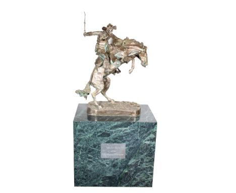 After Frederic Remington, Silver 'Bronco Buster' Inscribed on the sculpture "Henry Bonnard Foundry, New York, 1895 Cast". Num