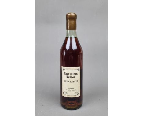 M. Louis Vallet Tres Vieux Petit Champagne Cognac Bottled 1986. Bottle Number 303 of 576.  Label reads "Aged in oak barrels b