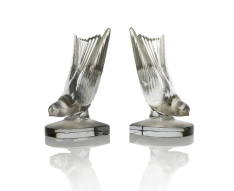 Rene Lalique, a pair of Hirondelle B glass bookends, model 1143-B-Bookends, designed circa 1942, frosted and polished, etched