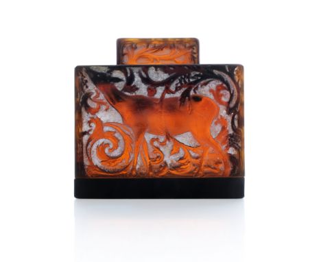 Rene Lalique, a Biches red amber glass inkwell, model 427, designed circa 1912, polished and white stained, with internal lin