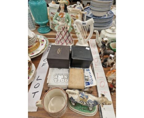 A CARLTON WARE GUINNESS HARP, A STAFFORDSHIRE LADY, A COW CREAMER, TWO WRISTWATCHES AND VARIOUS BOOKS AND MAGAZINES