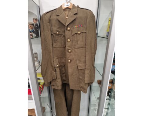 A ROYAL ARMY SERVICE CORPS KHAKI JACKET AND GREAT COAT