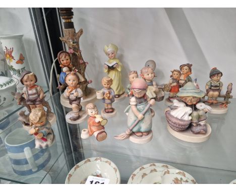 TWELVE HUMMEL FIGURINES TOGETHER WITH A DUCK FIGURE