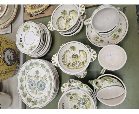 A QUIMPER POTTERY PART BREAKFAST SET PAINTED IN TONES OF GREEN