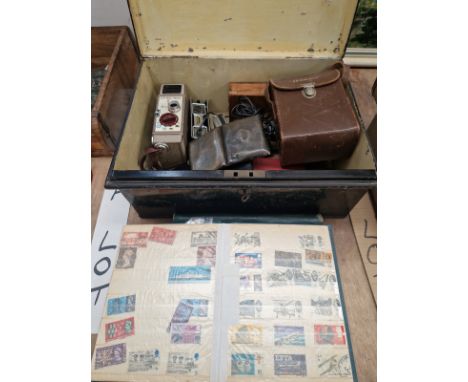 A METAL STRONG BOX TOGETHER WITH TWO STAMP ALBUMS, A SILVER CIGARETTE CASE, A CINE CAMERA, OPERA GLASSES, MOBILE PHONES, ETC