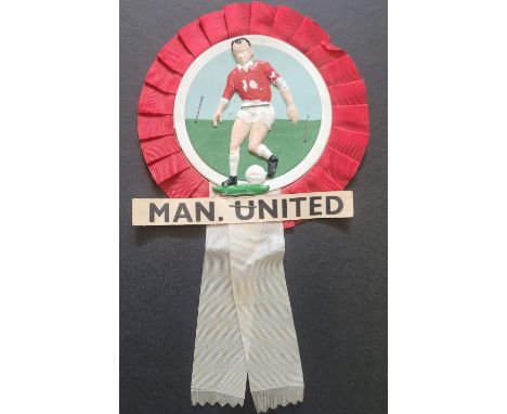 VINTAGE MANCHESTER UNITED ROSETTE
Some paint loss on footballer figure
Ref K