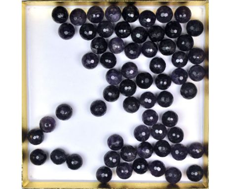 A quantity of faceted amethyst beads, bead diameter 14 mm.