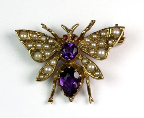 A 9ct gold amethyst and seed pearl butterfly brooch, W. 2.5 cm.