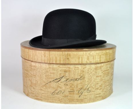 A vintage gentleman's Dunn and Co bowler hat, head size 17 x 20.5 cm.