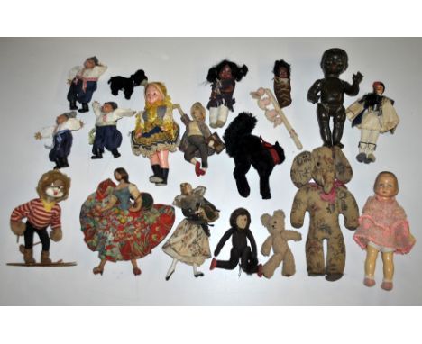 A quantity of vintage soft toys.