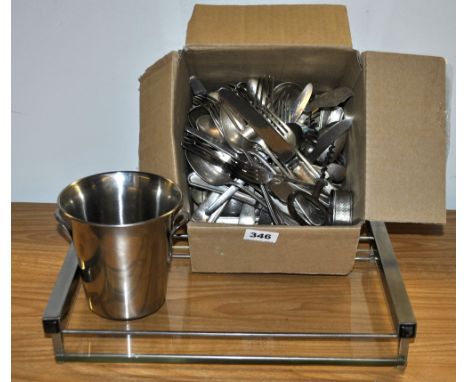 A vintage chrome and glass tray and a quantity of cutlery.