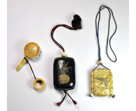 A Japanese bone inro, a further inro with netsuke and a carved bone snuff bottle with a carrying ring.