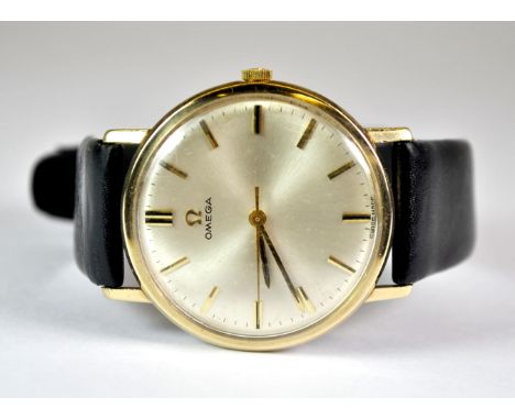 A gents 9ct gold vintage Omega wristwatch.