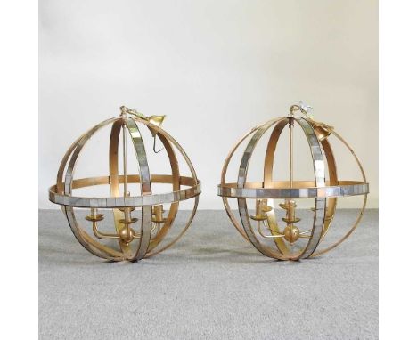 A large pair of Libra mirrored gilt globe ceiling lights, each 61cm diameter (2)