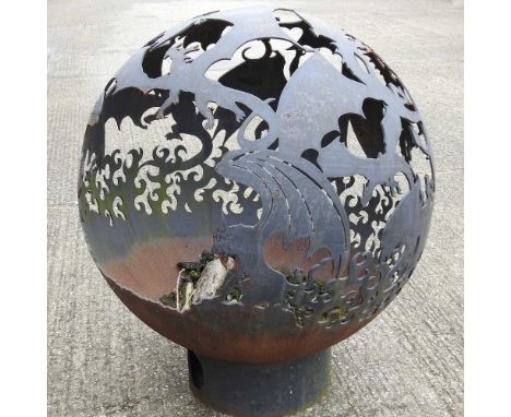 A hand made steel globe firepit, decorated with dragons, on stand, 102cm high