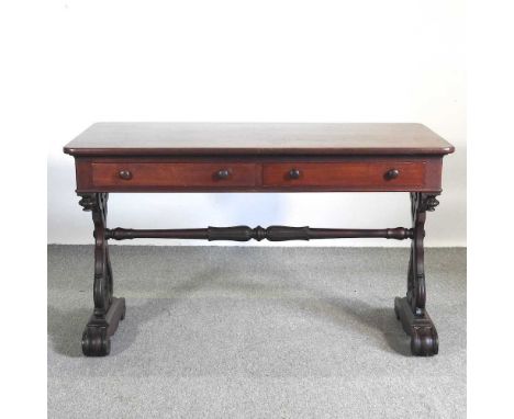 A Victorian mahogany sofa table, on carved end supports125w x 65d x 75h cm