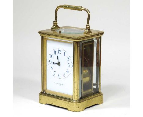 A 19th century brass cased carriage clock, the dial signed Elkington &amp; Co Ltd, Paris, with push repeat striking on a gong